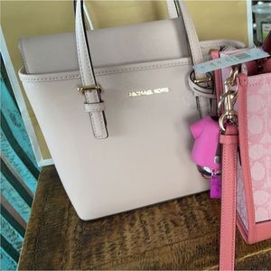 Brand new pinkish white Michael kors with matching wallet